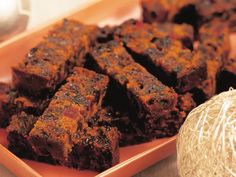 brownies on a plate next to a ball of twine