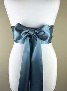 "Steel Gray Sash  Silver Gray Satin Sash  Obi Wrap Belt  Long Silver Sash  Wedding Accessories  Wedding Gown Bridal Sash  Satin Swank Make this Satin Swank® reversible waist sash the perfect finishing touch for your wedding, bridesmaid, or special occasion dress, or just the right piece to add instant polish to your dress or top.  This extra long version is 3.5 inches wide, 120 inches long, and will wrap around most waist sizes two times with a generous length remaining to tie in a bow or a simple knot with long-hanging tails.  Tie in front or in back.   Those with smaller waists may be able to wrap this extra-long sash around three times.  Position the waist wrap up high (just under the bustline) for a flattering, empire-waist effect. Luxury charmeuse satin in steel gray on both sides mea Waist Sash, Wrap Belt, Satin Sash, Wedding Sash Belt, Wedding Sash, Steel Grey, Wedding Belts, Bridal Sash, Small Waist