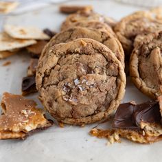 chocolate chip cookies with peanut butter and sea salt on the top, surrounded by crackers