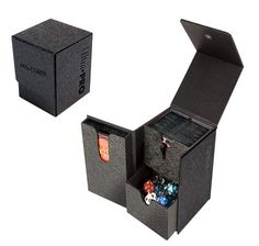 an open black box with dices in it and the lid opened to reveal its contents