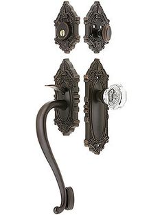 an old fashioned door handle and knob set