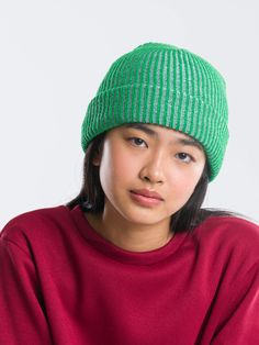 A two-tone colorful rib knitted beanie that fits both bigger kids and grown-ups. Stretches for a perfect, flattering fit on heads of all sizes and shapes. Recommended for ages 6 to adult! When worn, the rib knit stretches to reveal the second yarn color. Soft and lightweight for year-round wear. Cozy, hypoallergenic yarn and comfy, seamless construction. Sustainably made by Verloop, with upcycled deadstock yarn. Trendy Ribbed Knit Beanie, Trendy Warm Green Hat, Trendy Green Beanie Hat, Trendy Green Warm Hats, Trendy Ribbed Beanie, One Size Fits Most, Casual Green Knit Beanie, Green Knitted Beanie, Playful Multicolor Beanie, One Size Fits Most, Playful Multicolor Warm Beanie