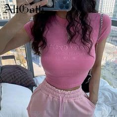 SPECIFICATIONSBrand Name: ALTGOTHStyle: Y2KAge: MIDDLE AGEOrigin: Mainland ChinaCN: ZhejiangSeason: SummerClothing Length: short£¨4-16inch£©Decoration: embroideryElasticity: Slight StrechSleeve Style: regularFabric Type: BroadclothMaterial: COTTONMaterial: POLYESTERPattern Type: LetterModel Number: ZJ240114WTX03Support: Dropshipping,WholesaleColor: PinkSize: S,M,LChoice: yes Rave Outfits Pink, Goth Rave Outfits, Pink Baby Tee, Goth Rave, Letters Embroidery, Punk Dress, Streetwear Grunge, Gothic Clothes, Women Y2k