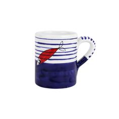 a blue and white striped mug with a red surfboard on it