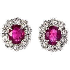 A beautiful pair of stud earrings set in Platinum featuring a total of 0.77 Carats Natural Rubies from Burma and 0.50 Carat Diamonds. Rubies are referred to as "Ratnaraj" in Sanskrit meaning the King of Gems. Early cultures treasured rubies for their similarity to the redness of the blood that flowed through their veins, and believed that rubies held the power of life. Stamping detailed below. Contact Us for more information. -------------------------------------------------------------------------------------- Established in 1994, Rita Fine Jewelry has been making beautiful jewelry for the past 25 years plus. We specialize in Colored Stone Jewelry and offer a wide range of products including rings, pendants, bracelets and earrings. Our Jewelry comprises of exquisite stones such as Emerald Sanskrit Meaning, Burmese Ruby, Vintage Stud Earrings, Rosecut Diamond Ring, Modern Engagement Rings, Colored Stone, Diamond Ring Settings, Halo Diamond Ring, Modern Earrings