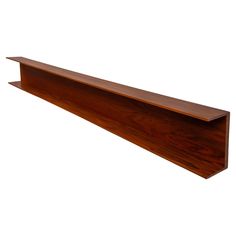 a wooden shelf is shown against a white background