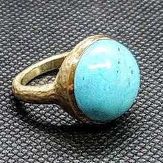 14k solid hammered yellow gold ring with 13.5 ct. 16.5 mm round shape natural spider turquoise. This item can also be ordered in rose or white gold with different color gemstones such as, green tourmaline, pink tourmaline, rutilated quartz, onyx, labradorite, white agate, all colors of chalcedony and aquamarine, please contact for a quote as each gemstone varies in price. I am a manufacturer of fine jewelry for over thirty years, loyalty & customer satisfaction has always been my ultimate go Gold Turquoise Ring With Gemstone, Gold Turquoise Ring For Anniversary, Handmade Yellow Gold Turquoise Ring, Handmade Turquoise Ring In Yellow Gold, Round Turquoise Gemstone Ring In 14k Gold, 14k Gold Turquoise Gemstone Ring, Elegant Gold Turquoise Round Ring, 14k Gold Turquoise Round Ring, Unique 14k Gold Dome Ring