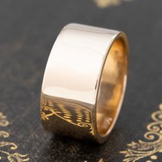 Chic and timeless cigar band from Tiffany & Co! She is the perfect index finger or middle finger ring and better yet, an engagement band or wedding band. Unique and one of a kind - she slips on like buttah on the finger! 14kt yellow gold Size 7.5 & resizable with limitations 10.4mm in width & 1.33mm thick 12.1 grams Please see qualitative report for more information. 14k Rose Gold Wide Band Wedding Ring, Elegant Formal Wide Band Ring With Decorative Band, Elegant Wide Band Ring With Decorative Band, Classic Rings With Decorative Open Band, Luxury Bands With Polished Edges For Anniversary, Timeless Thick Band Ring For Anniversary, Formal Rings With Decorative Wide Band, Classic Formal Wide Band Ring With Polished Edges, Classic Formal Wide Band Ring With Open Band