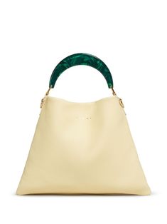 butter yellow/forest green calf leather grained texture logo stamp to the front concealed magnetic fastening gold-tone hardware adjustable detachable shoulder strap single top handle main compartment internal slip pocket Modern Yellow Satchel With Gold-tone Hardware, Modern Green Calf Leather Bag, Yellow Satchel With Gold-tone Hardware And Top Handle, Yellow Top Handle Satchel With Gold-tone Hardware, Modern Green Satchel With Gold-tone Hardware, Chic Green Shoulder Bag With Round Handle, Calf Leather Satchel With Round Handle, Green Bag With Detachable Strap And Round Handle, Green Leather Shoulder Bag With Round Handle