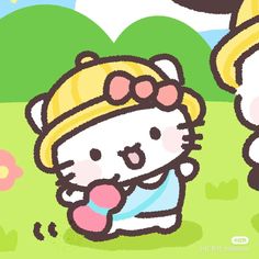 an image of hello kitty in the grass