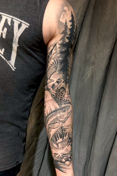 a man with a tattoo on his arm