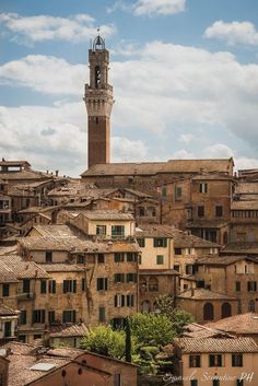 an old city with buildings and a clock tower