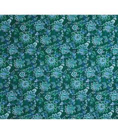 a green and blue floral pattern on fabric