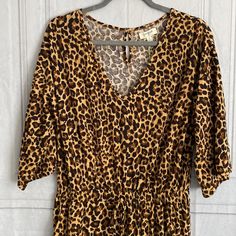 Leopard Print Jumpsuit Wide Legs, Button Closure, Side Pockets Medium Inseam 25.5” Waist Flat 15” Pit To Pit 22” Top Of Shoulder To Waist 19” Overall Length Shoulder To Hem 55.5” Casual Brown V-neck Jumpsuits And Rompers, Brown V-neck Jumpsuits And Rompers For Loungewear, Brown Fitted V-neck Jumpsuits And Rompers, Brown Fitted V-neck Jumpsuit, Brown V-neck Jumpsuits And Rompers For Spring, Spring Brown V-neck Jumpsuit, Leopard Print Jumpsuit, Bell Sleeve Romper, Off Shoulder Romper