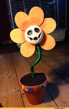 a flower that is sitting in a pot