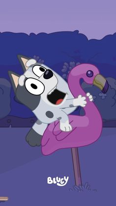 a cartoon cat riding on top of a pink flamingo in front of a purple sky