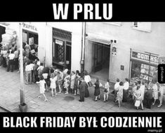 a group of people standing in front of a building with words on it that read w p rlu black friday by coziene