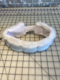 "I made this child size faux fur headband out of Creamy White Mink faux fur, 100% polyester. I lined the headband with white fleece and added velcro tabs in the back for a perfect fit...adjustable from 19\" to 21\" around head. A perfect accessory for any season." Head Warmer, Faux Fur Headband, Headband Diy, Hand Muff, Fur Headband, Headband Black, White Fleece, Black Headband, Diy Headband