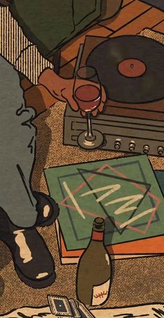 a person standing next to a record player with a glass of wine in front of it