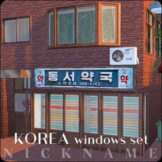 an image of a building that has windows on the front and side of it in korean