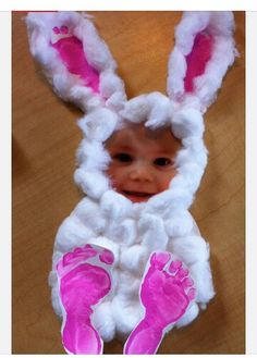 the baby is dressed up as a bunny