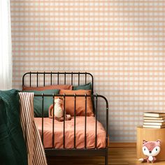 a bedroom with a bed, nightstand and books on the floor