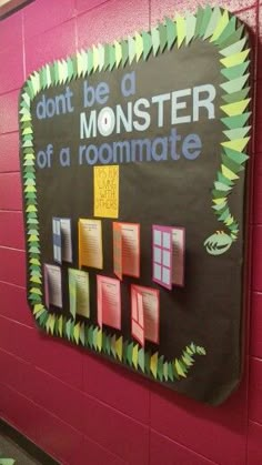 a bulletin board that says don't be a monster of a roommatee on it