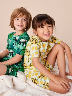 Your little dreamer will love snuggling up in our handsome short-sleeve pajama set featuring prints hand-drawn by Tea's San Francisco artists. Crafted of 100% soft cotton rib--brushed inside for extra softness--that will keep your sleepy sweetie pie super cozy but not too toasty. Family Matching Sets With Cartoon Print Short Sleeves, Cartoon Print Bedtime Sets For Summer, Family Matching Sleep Pajama Sets With Short Sleeves, Summer Bedtime Sets With Cartoon Print, Family Matching Sleep Sets With Short Sleeves, Playful Printed Sleepwear In Relaxed Fit, Playful Printed Sleepwear With Relaxed Fit, Short Sleeve Sets With Cartoon Print For Playtime, Playful Printed Relaxed Fit Sleepwear