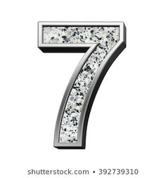 the number seven is made up of white and silver stones with black dots on them