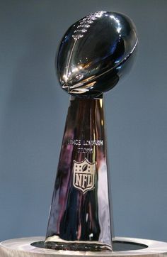 a football trophy sitting on top of a table