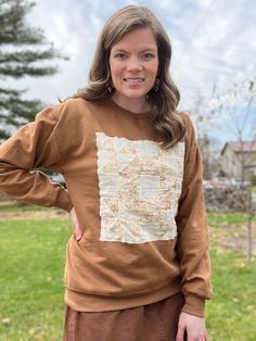 "Introducing our NSV Quilt Sweatshirt!  This soft, super comfy, quality sweatshirt features a beautiful block from a 1930s handmade quilt.   This comfy piece is the perfect cozy wardrobe staple or gift for that special someone in your life!  This sweatshirt measures 48\" across the bust, and 27.5\" in length.   Check out our shop for more quilt vests and coats!" Cotton Sweatshirt With Patchwork In Relaxed Fit, Vintage Cotton Patchwork Sweatshirt, Cozy Cotton Patchwork Tops, Quilt Sweatshirt, Cozy Wardrobe, Quilted Sweatshirt, Length Check, Womens Sweatshirts, Antique Quilt