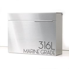 a stainless steel box with the word marine grade printed on it's front side