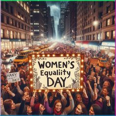 women's equality day sign surrounded by people