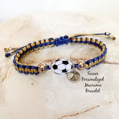 Soccer bracelet, Macrame bracelet, Waxed cord bracelet, Sport bracelet, Team sport jewelry, Personalized jewelry, custom sport jewelry MATERIAL*DIMENSIONS*DETAILS waxed cord Soccer charm OPTION MENUS Select cord color (enter second color in the personalization section if desired) Select bracelet size All our jewelry and gifts are custom made and packaged in complimentary gift boxes.  Everything ships within 3 business days. Thanks so much for stopping by & God Bless! Sporty Adjustable Bracelet Customizable, Sporty Adjustable Customizable Bracelet, Sporty Customizable Adjustable Bracelet, Sporty Adjustable Customizable Bracelets, Adjustable Personalized Sports Wristband, Adjustable Personalized Wristband In Team Colors, Customizable Adjustable Sports Bracelet, Adjustable Personalized Bracelets For Team Events, Adjustable Personalized Team Spirit Jewelry