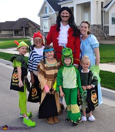 a group of people dressed up in costumes