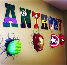 a wall with some avengers letters on it