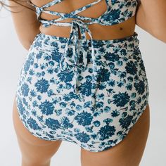 The highest waist with slimming ruching in the prettiest floral print. These blues shine on a light background to complete these fully-lined swim bottoms. This is the full coverage bikini bottom you've been looking for! Fully-lined Full coverage Hand-drawn floral print 45 UPF Pair with our Santorini Bella Tankini, Santorini Bella Crop Top, and Santorini Switchback Crop. FREE U.S. Standard Shipping! More info hereModel is wearing size S90% NYLON - 10% SPANDEXHand wash cold and lay flat to dry Albion Fit Swim, Albion Fit Swimsuit, Albion Fit, High Waisted Swim Bottoms, Maternity Swimsuit, Light Background, Swim Skirt, Swim Suit Bottoms, Shine On