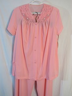 "Soft. Silky. Pink. Never worn. Deadstock with Tags Shadowline Light Rose Pink Lace Embroidered Two Piece Short Sleeve Pajama Set! Women's 36 Bust Made in USA Lace inset bodice with embroidered rosebuds. And, new with tags and unworn! Smoke free of course! We're listing thousands of vintage clothing items from the 70's and earlier, new items every day so please check back! We take requests! PLEASE check the measurements as vintage clothing sizes may not comparable to contemporary sizes. Measurem Pink Sleepwear With Pockets Relaxed Fit, Vintage Pink Sleepwear, Vintage Pink Sleepwear For Bedtime, Pink Button-up Sleepwear For Spring, Pink Vintage Floral Print Sleepwear, Waist Stretches, Wool Shirt, Light Rose, Lace Inset