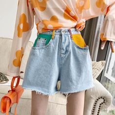 Material: Cotton Gender: WOMEN Fit Type: REGULAR Style: Casual, Aesthetic Soft Girl Item Type: Shorts Decoration: Pockets Closure Type: Button Fly Waist Type: High Pant Style: REGULAR Pattern Type: Patchwork Size (cm) Waist Hip Length S 66 88 37 M 70 92 38 L 74 96 39 Trendy Cotton Jean Shorts, Trendy Colorful Bottoms For Spring, Casual High Waist Multicolor Jeans, Trendy Colorful Spring Bottoms, Colorful High-waist Bottoms For Spring, High Waist Colorful Bottoms For Spring, High-waisted Colorful Bottoms For Spring, Trendy Patchwork Shorts For Summer, Casual Patchwork Jean Shorts