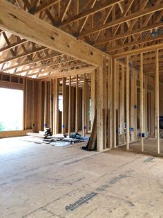 the inside of a house being built with wood framing