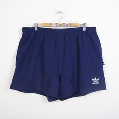 Cool training shorts in size XL from Adidas. Waist size is approx. 49 cm and stretchy and length approx. 44 cm. Has a waistband to tie at the hips and two front pockets. With cotton inner lining or inner pants. Outer material: 100% polyester, inside 100% cotton. You can find more sports pants and other vintage clothes in our Etsy shop. If you have any questions, just write to us! Your Soul&Style from Berlin P.S.: Our clothes are vintage, so not new. We list defects that go beyond expected signs Jogging Shorts With Elastic Waistband, 90s Style Stretch Short Bottoms, Casual Jogging Shorts With Short Legs, Casual Jogging Shorts, 90s Style Bottoms With Built-in Shorts, 90s Style Sports Shorts, Cotton Jogging Shorts, 90s Bottoms With Built-in Shorts, 90s Style Relaxed Fit Shorts With Built-in Shorts