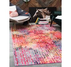 a colorful rug with a horse on it in front of a wooden paneled wall