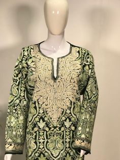 Embroidered Green Kaftan For Festivals, Elegant Kaftan With Multicolor Resham Embroidery, Intricate Embroidery Jamawar Fabric, Bollywood Style Embroidered Green Kaftan, Elegant Multicolor Embroidered Kurta For Transitional Seasons, Green Long Sleeve Traditional Wear With Motifs, Bollywood Style Green Embroidered Kaftan, Festive Elegant Multicolor Embroidered Kaftan, Elegant Festive Multicolor Embroidered Kaftan