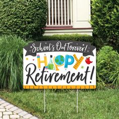 a sign that says school's day friend happy retirement on the grass in front of some bushes