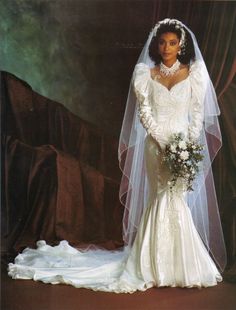 a woman in a wedding dress and veil