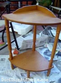 a wooden shelf sitting on top of a table