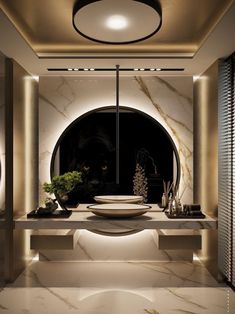 a bathroom with a large round window in the center and white marble countertops on both sides