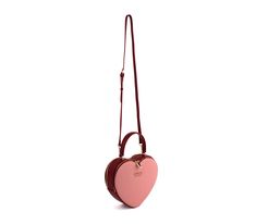 STYLE & INSPIRATION You can never go wrong with a heart shape bag and our Sweetheart bag is a classic! Large enough to hold a full size wallet and other essentials, the double zippers make it easy to reach your hand inside the bag. Add a touch of bling with our luxury crystal logo that’s sure to be a head turner and almost a piece of jewelry on your accessory. Get ready to fall in love with your new favorite crossbody bag. Dimensions: 9W x 9H x 4 D ; 4"L top handle & 20"L removable, adjustable s Valentine's Day Crossbody Shoulder Bag With Zipper, Valentine's Day Crossbody Bag With Zipper Closure, Valentine's Day Gift Shoulder Bag With Zipper Closure, Valentine's Day Gift Shoulder Bag With Zipper, Pink Heart-shaped Bag For Everyday Use, Valentine's Day Crossbody Bag With Removable Pouch, Valentine's Day Gift Bags With Zipper Closure, Valentine's Day Heart-shaped Bag With Removable Pouch, Heart-shaped Pink Bag With Removable Pouch