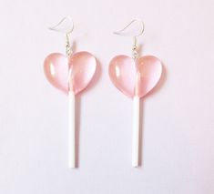 A pair of cute heart shaped lollipop earrings ♡   Each resin lollipop measures at about 6.5cm Comes with rubber earring backs Pink Heart Lollipop, Pink Lollipop, Heart Shaped Lollipops, Lollipop Earrings, Heart Lollipop, Gold Bar Earrings Studs, Kawaii Pastel Goth, Aesthetic Earrings, Quirky Jewelry