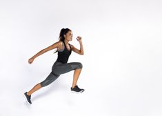 a woman is running on a white background